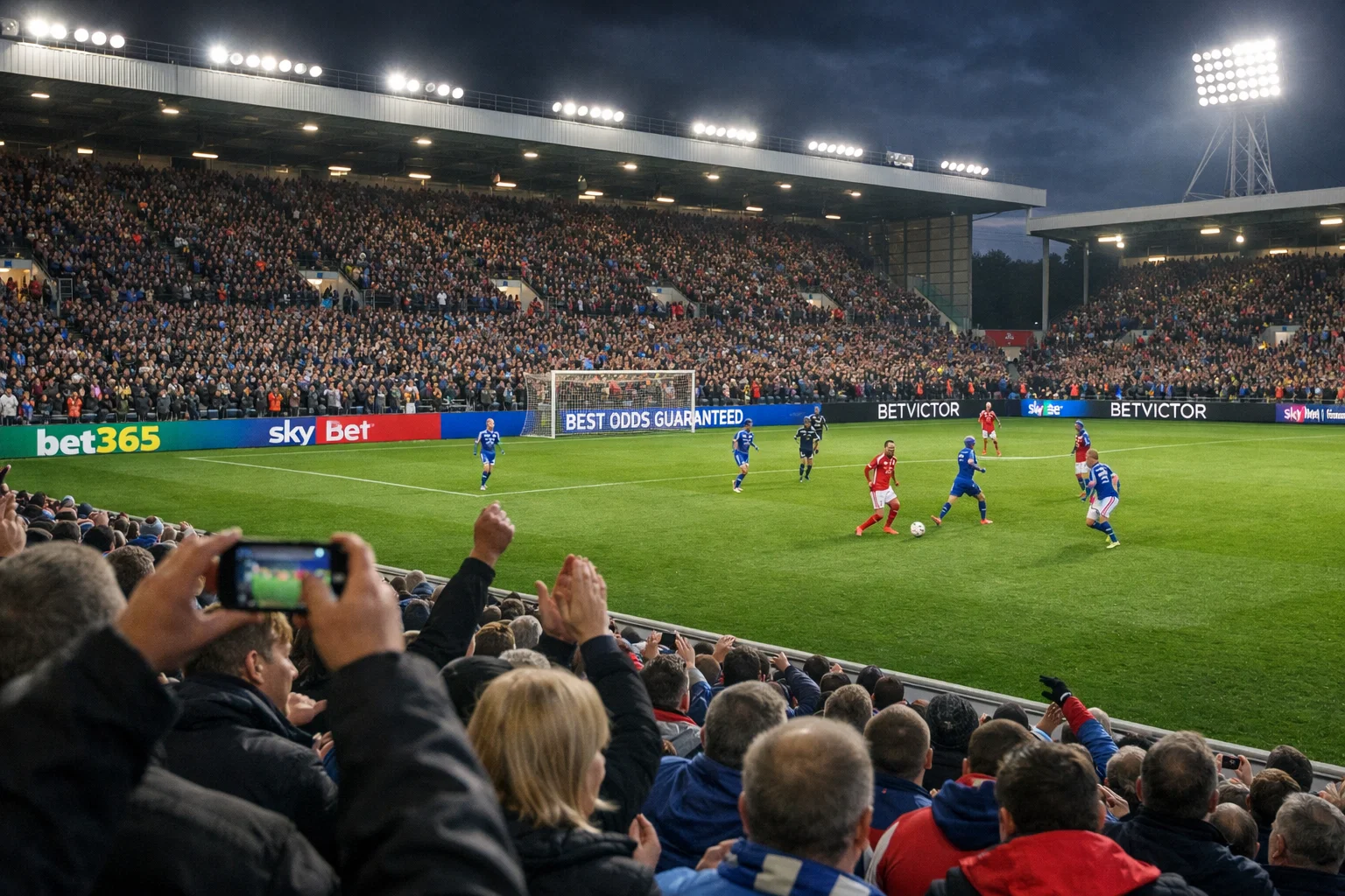 Stade de Championship anglais avec panneaux publicitaires Sky Bet visibles